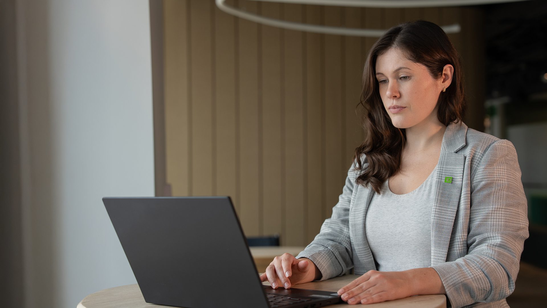 A human resources professional uses a tablet to explain how to search for jobs.